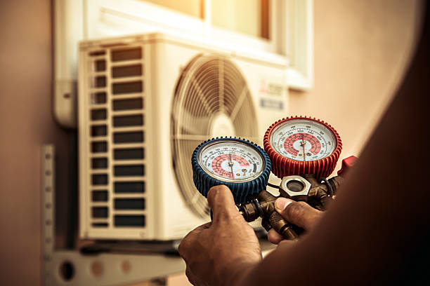 Professional Hvac technician working in Melrose Park, NY